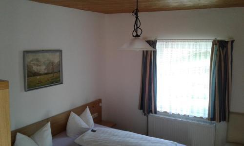 Foto de una habitación de Hotel Garni Post