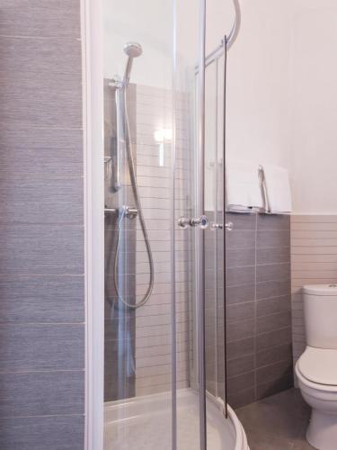 Foto del baño de Hôtel le Chardon Bleu