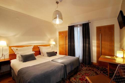 Foto de una habitación de Hotel Mestre de Avis
