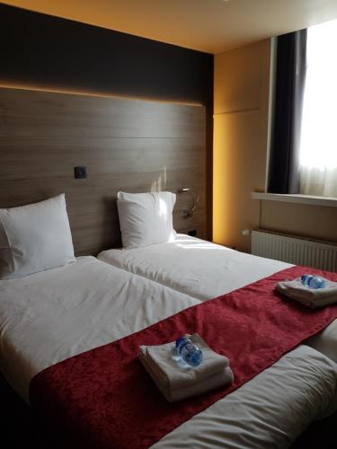 Foto de una habitación de Hotel Industrie