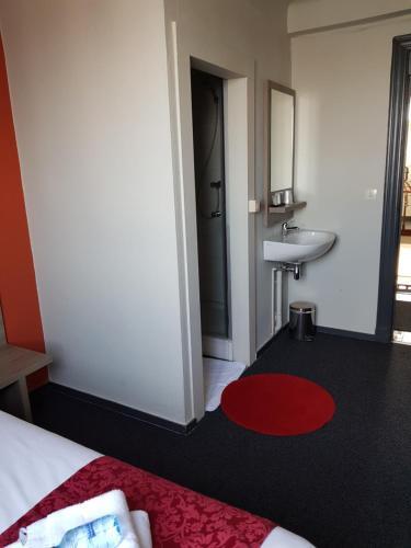 Foto del baño de Hotel Industrie