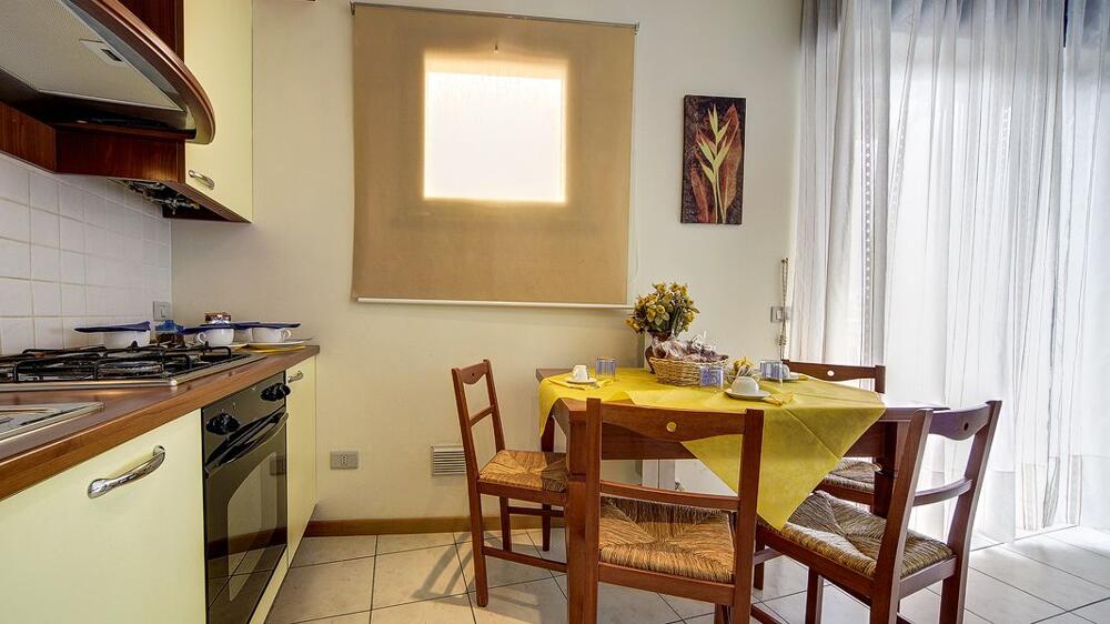 Foto de una habitación de Aparthotel Residence Le Corniole