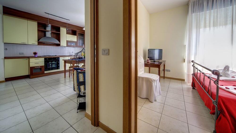 Foto de una habitación de Aparthotel Residence Le Corniole