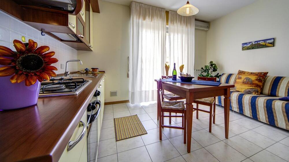 Foto de una habitación de Aparthotel Residence Le Corniole