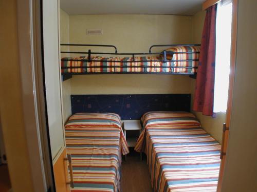 Foto de una habitación de Camping Village Torre Pendente