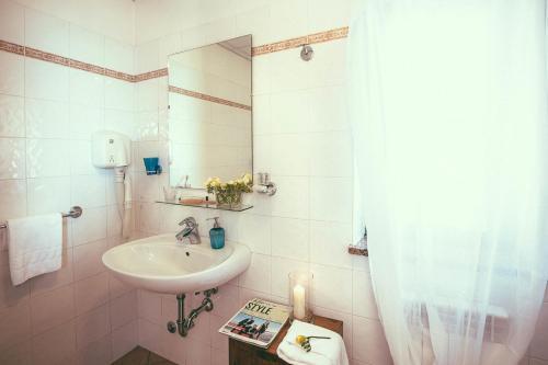 Foto del baño de Hotel Sirenetta