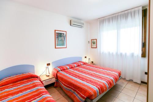 Foto de una habitación de Alquileres Vacacionales Olmi Lido Altanea