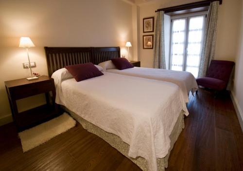 Foto de una habitación de Casa Rural Las Casas Rurales Huerta San Benito