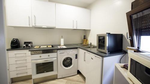 Foto de una habitación de Cervantes Apartamentos
