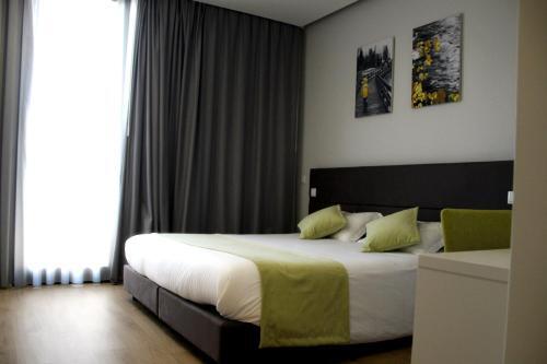 Foto de una habitación de Basto Vila Hotel