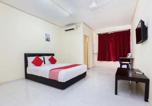 Foto de una habitación de OYO 89640 Hotel Pelangi Marang