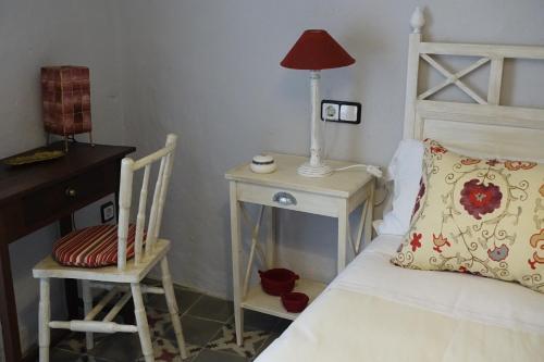 Foto de una habitación de Apartamentos La Dama Azul