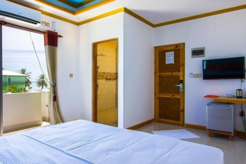Foto de una habitación de Kurumba Villa Boutique Hotel