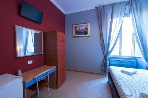 Foto de una habitación de Albergue Alessandro Palace &amp;amp; Bar