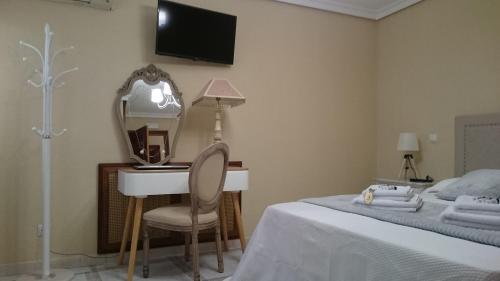 Foto de una habitación de Casa de Huéspedes Vecinodecerbantes