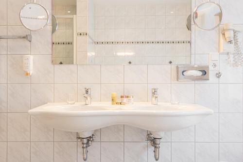 Foto del baño de Hotel Lohmann&amp;#039;s Kapeller Hof
