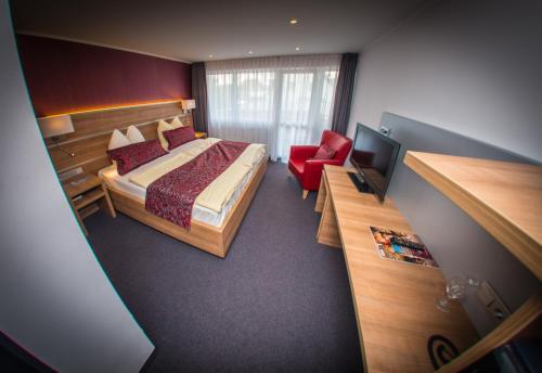 Foto de una habitación de Hotel Hellers Krug