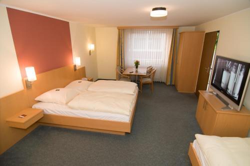 Foto de una habitación de Hotel Hellers Krug