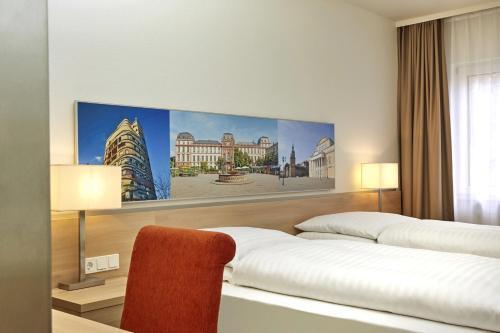 Foto de una habitación de H+ Hotel Darmstadt