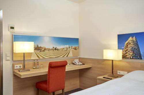 Foto de una habitación de H+ Hotel Darmstadt