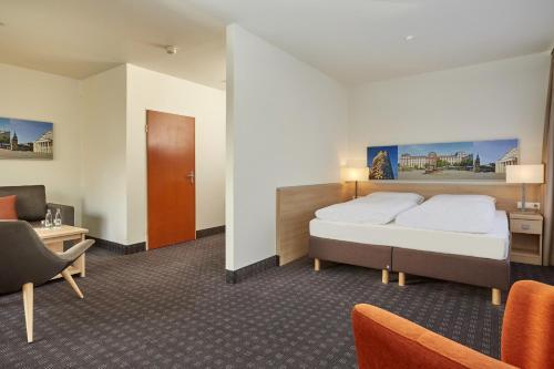 Foto de una habitación de H+ Hotel Darmstadt