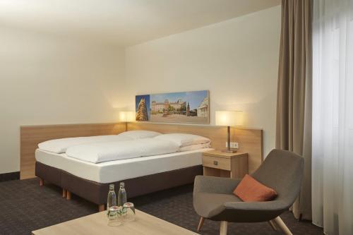 Foto de una habitación de H+ Hotel Darmstadt