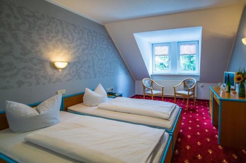 Foto de una habitación de Hotel Gasthof zur Heinzebank