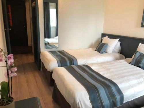 Foto de una habitación de Hotel Le Noirlac
