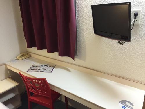 Foto de una habitación de Hôtel Les Archers