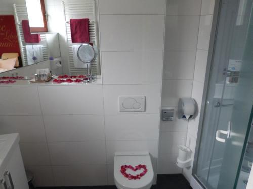 Foto del baño de Hotel Hof 19 - Das charmante Ambienthotel
