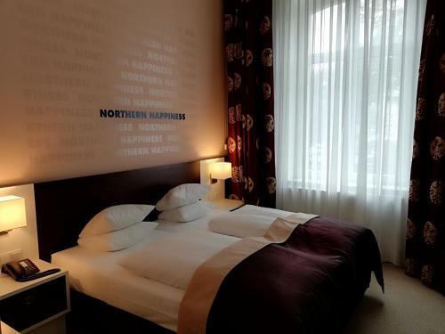 Foto de una habitación de Navigare NSBhotel