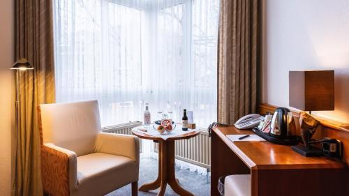 Foto de una habitación de Hotel Am Stadtpark
