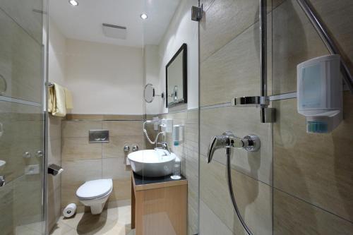 Foto del baño de Hotel Goldene Sonne