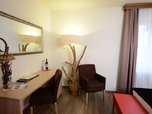 Foto de una habitación de Land-gut Hotel zum Löwen Garni