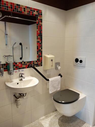 Foto del baño de Hotel La Corniche