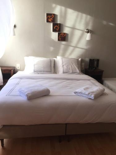 Foto de una habitación de Bed-and-Breakfast Chambre d&amp;#039;Hôtes Au Jardin Des Saveurs