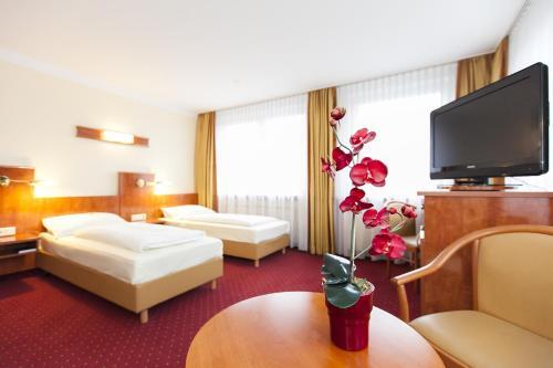Foto de una habitación de Hotel am Berliner Platz
