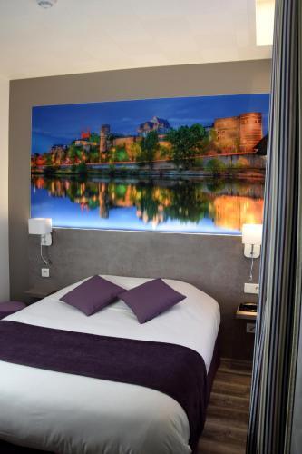 Foto de una habitación de Hotel Citotel L&amp;#039;univers