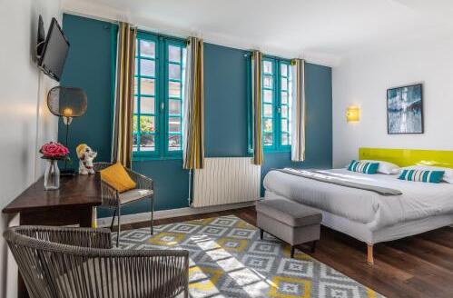Foto de una habitación de Hotel Le Port Neuf