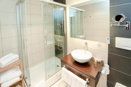Foto del baño de Hotel am Hopfensee
