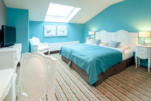 Foto de una habitación de Hotel am Hopfensee