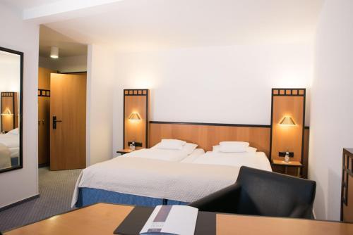 Foto de una habitación de Hotel Schere
