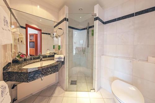 Foto del baño de Wittlers Hotel