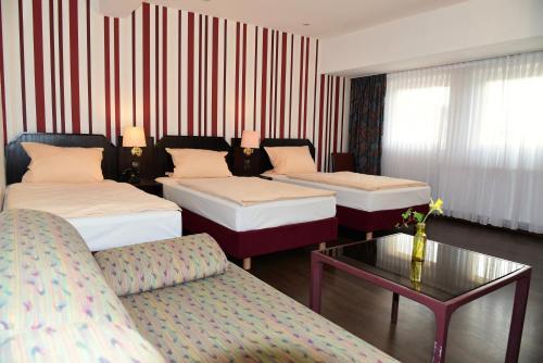 Foto de una habitación de Hotel Harsshof