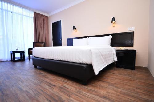 Foto de una habitación de Tun Fatimah Riverside Hotel