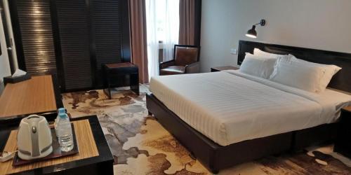 Foto de una habitación de Tun Fatimah Riverside Hotel