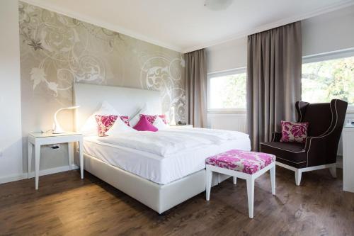 Foto de una habitación de Parkhotel Bilm im Glück am Stadtrand Hannovers