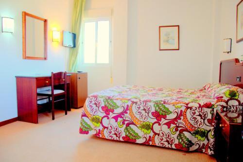 Foto de una habitación de Hotel Palmero