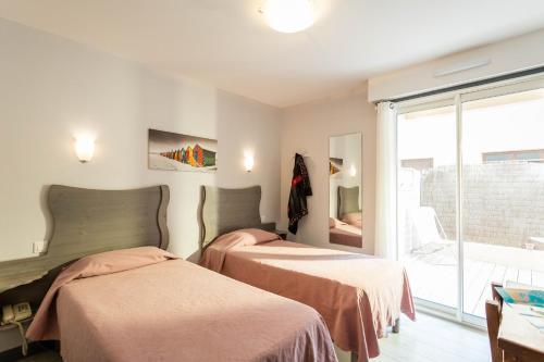 Foto de una habitación de Hotel de la Plage