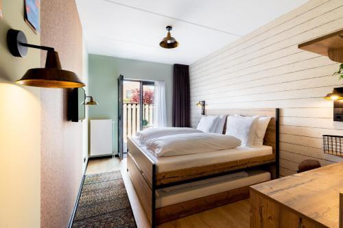 Foto de una habitación de Hotel De Kroon